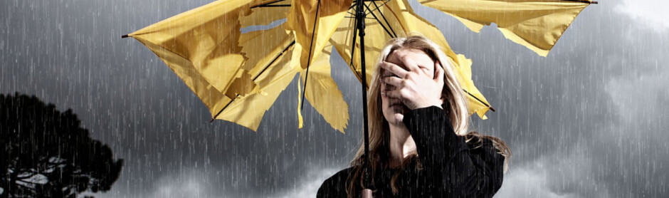 Somber woman with Unbrella