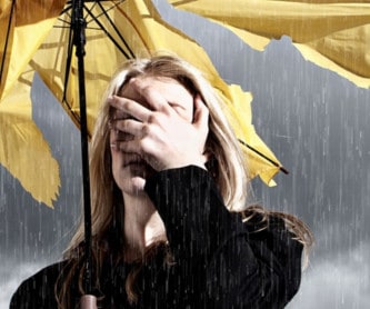 Somber woman with Unbrella